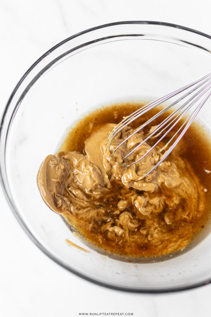 This homemade peanut butter granola is satisfying and delicious. Made with basic pantry ingredients— oats, cinnamon, coconut oil, honey, and maple syrup. With tons of flavor in each bite, you'll keep coming back for more!