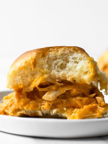 These buffalo chicken sliders are an instant crowd-pleaser. Toss the ingredients together in a slow cooker and let it do 99% of the work for you! Your guests will be coming back for more— perfect for game days!