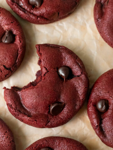 These red velvet chocolate chip cookies are a colorful spin on the classic chocolate chip cookies. Enjoy the soft-baked centers, chewy edges with hints of buttery, cocoa and vanilla flavors. While the cookies are still warm, gently press a few chocolate chips to the tops for a finished Valentine’s Day or Christmas cookie!