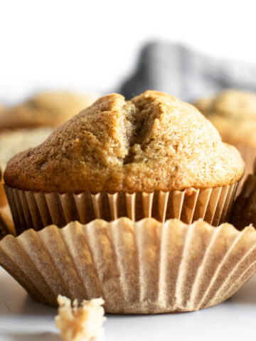 With a moist crumb and lots of banana flavor, these easy banana muffins are soft, buttery and every bit delicious. Toss in your favorite add ins like walnuts or chocolate chips. Make a double batch to freeze– the perfect way to use up overripe bananas! Ready in just 30 minutes, these will be your new favorite banana muffins.