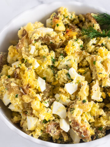 This savory herb smashed potato salad is spiced just right, packed full of crispy baby potatoes and tossed in an incredibly flavorful buttermilk dressing. It's a delicious side dish for BBQs, picnics and a recipe that family and guests will love!