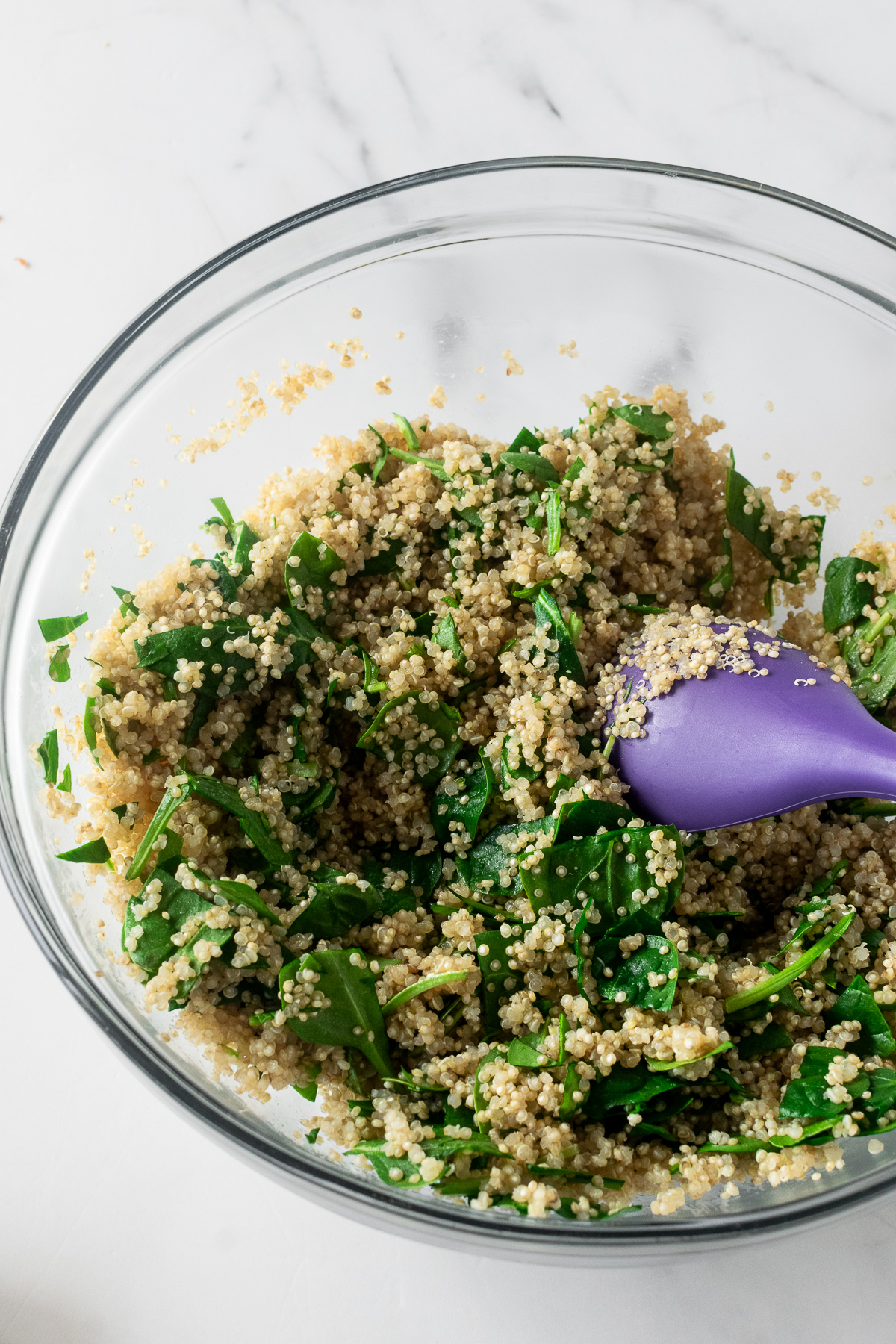 quinoa and spinach combined in bowl