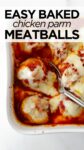 baked chicken parmesan meatballs in a white baking dish with spoon.