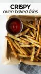 french fries on a baking sheet with a napkin.