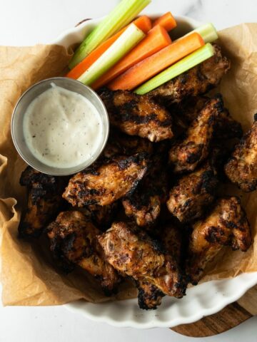 This is the best grilled chicken wings recipe that you'll ever have! Incredibly simple to make– just pat dry, toss in the flavorful dry rub and throw on the grill. The grilled wings get crispy on the outside and stay tender and juicy on the inside. Let the grill do the hard work for you!