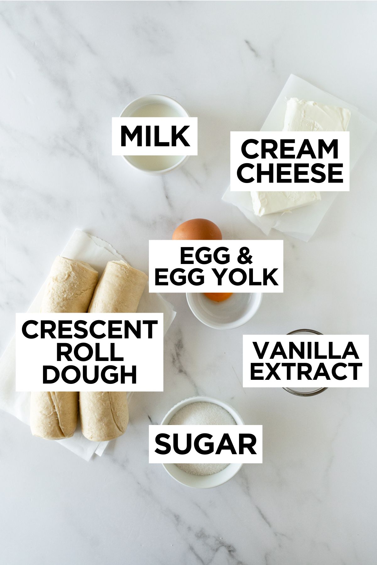 ingredients for crescent roll cream cheese danish such as crescent roll dough, sugar, egg, cream cheese, milk and vanilla.