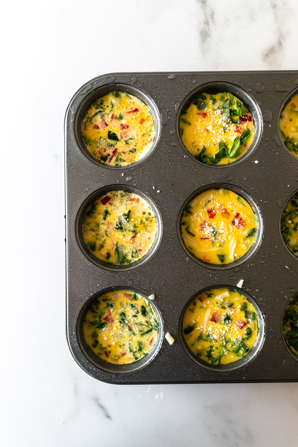 egg mixture in muffin tins.