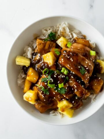 This baked pineapple teriyaki chicken is a popular, quick and easy dinner recipe that's loved by many. Ready in just 35 minutes– juicy and tender chicken with pineapple baked in an incredibly flavorful (and simple!) homemade teriyaki sauce. I'm certain this baked teriyaki chicken recipe will become a regular in your dinner rotation!