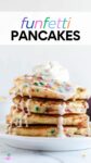 a stack of pancakes topped with vanilla glaze, sprinkles, and whipped cream with a fork with overlay text "funfetti pancakes".