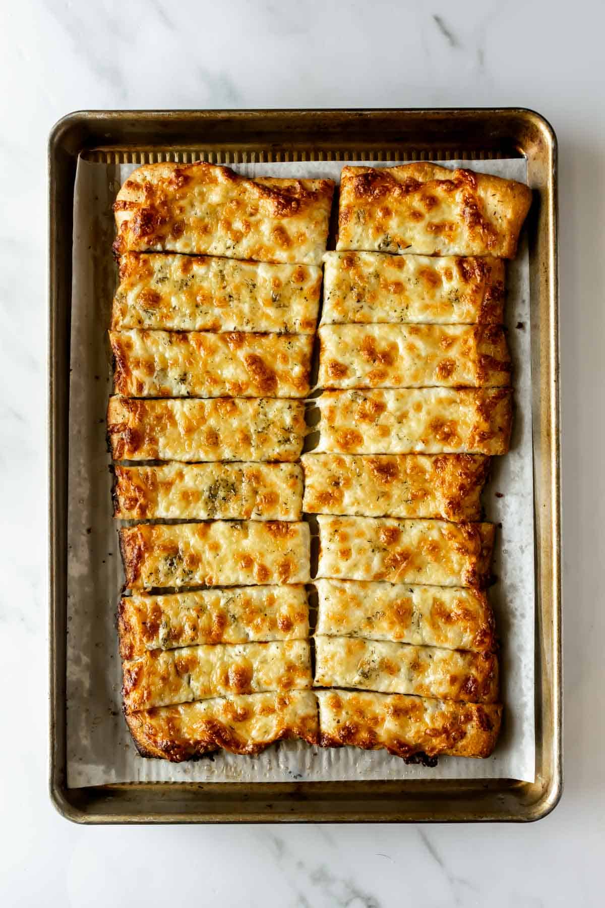 cheese bread on a baking sheet