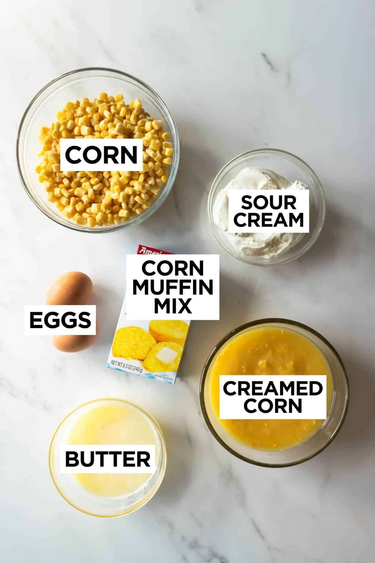 ingredients for corn casserole with overlay text.