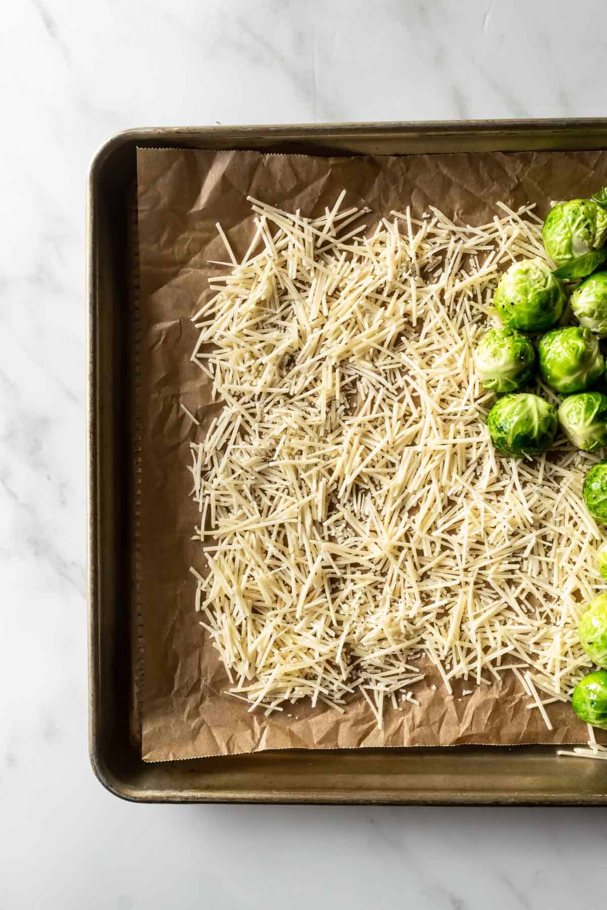 parmesan cheese on a baking sheet.