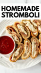 homemade stromboli on a plate with overlay text.