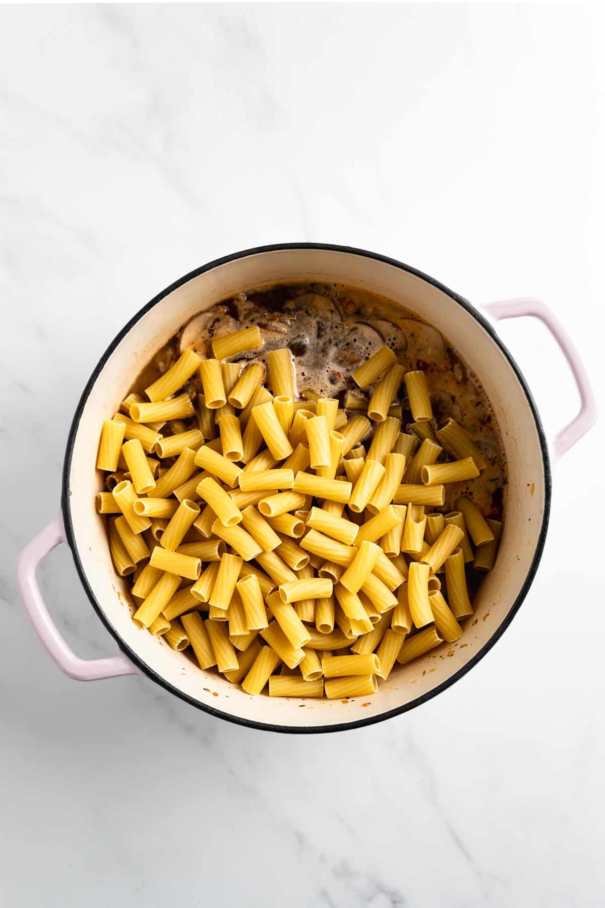 rigatoni pasta in a pink pot.