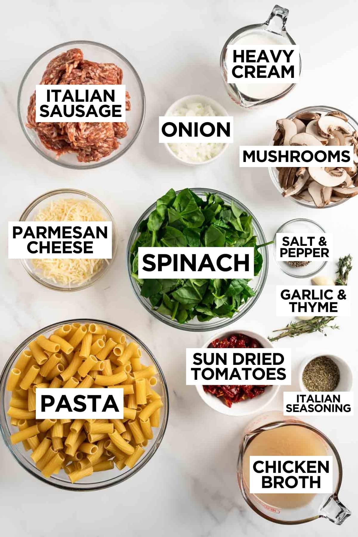 creamy tuscan sausage pasta ingredients in bowls with overlay text.