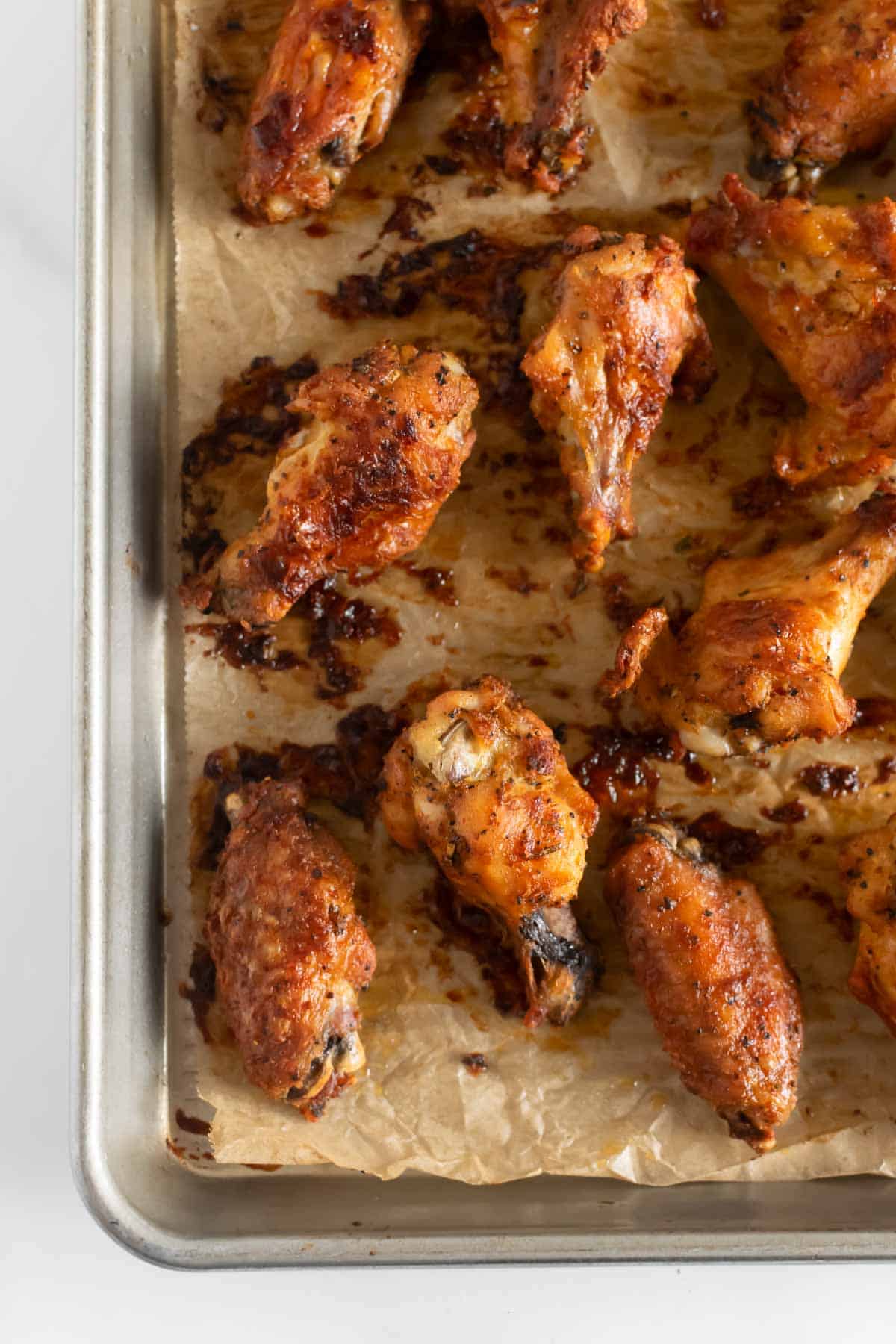 baked chicken wings on a baking sheet.