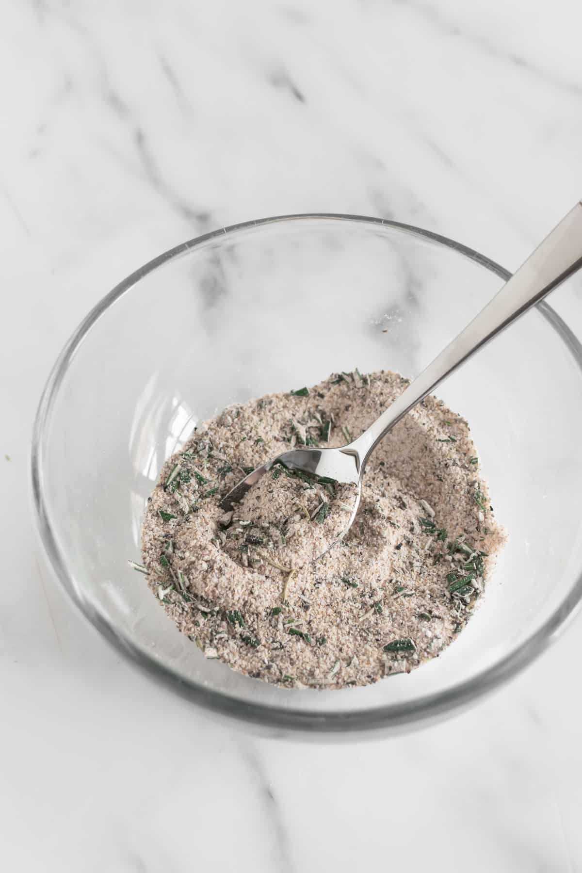 dry rub for baked chicken wings mixed together in a bowl.