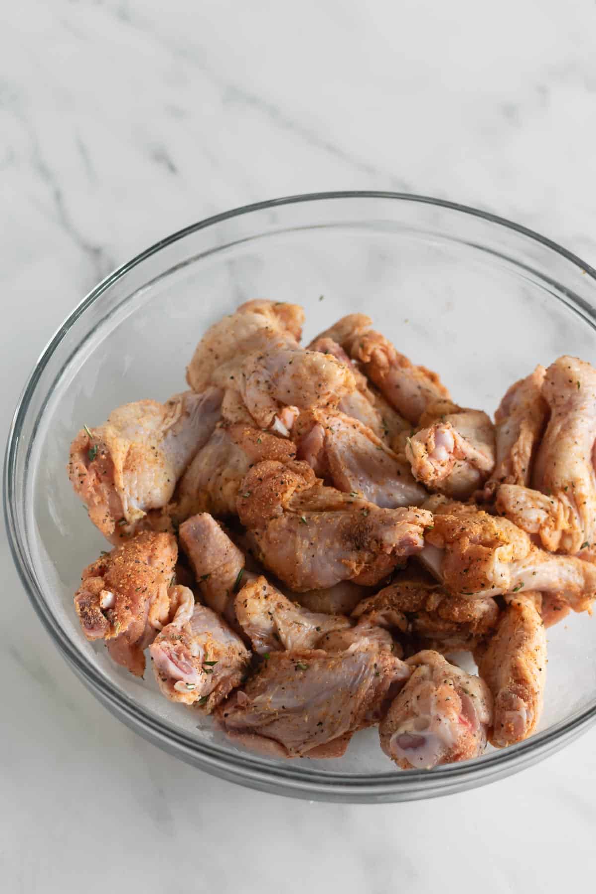 chicken wings tossed in a dry rub.