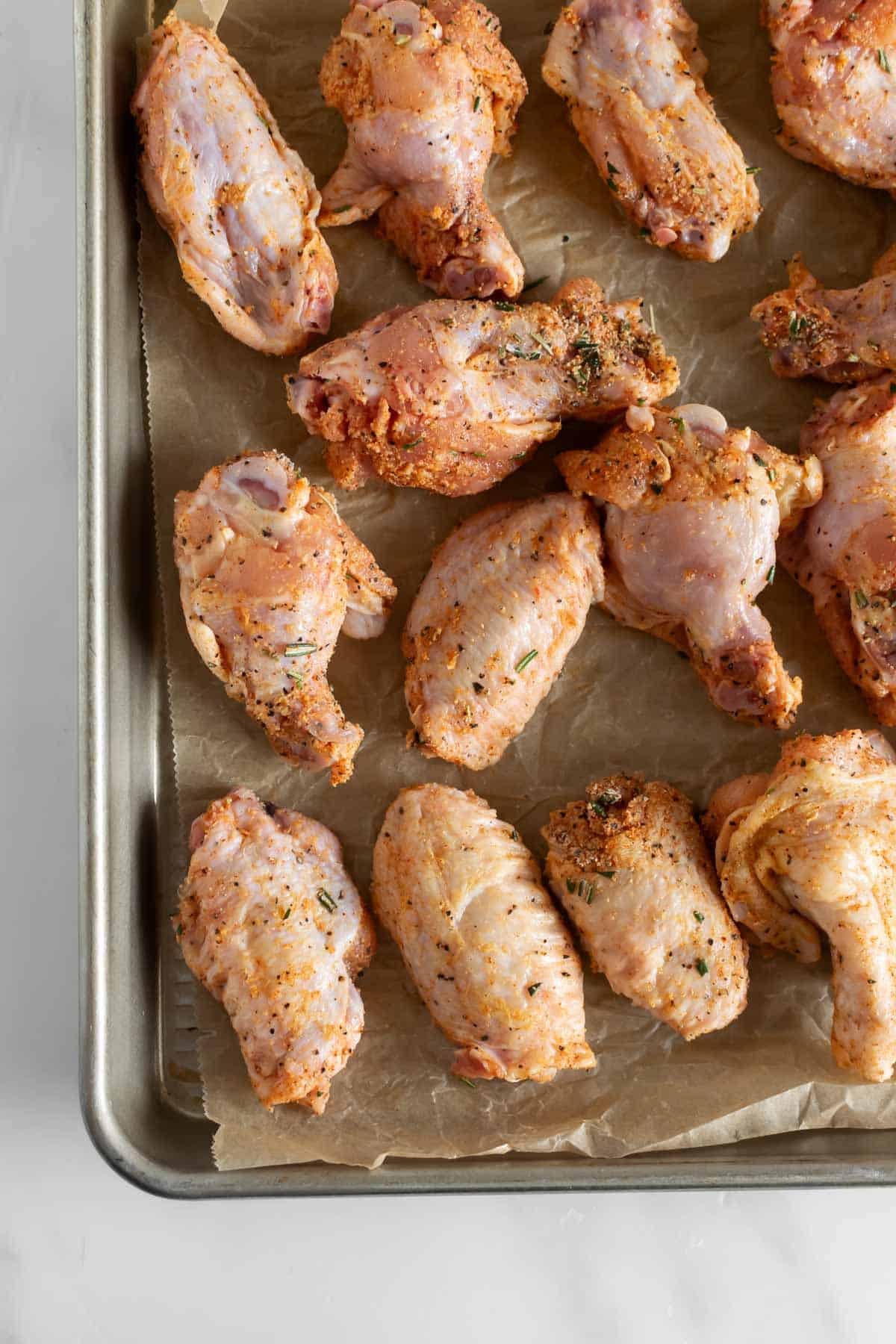 chicken wings on a baking sheet.