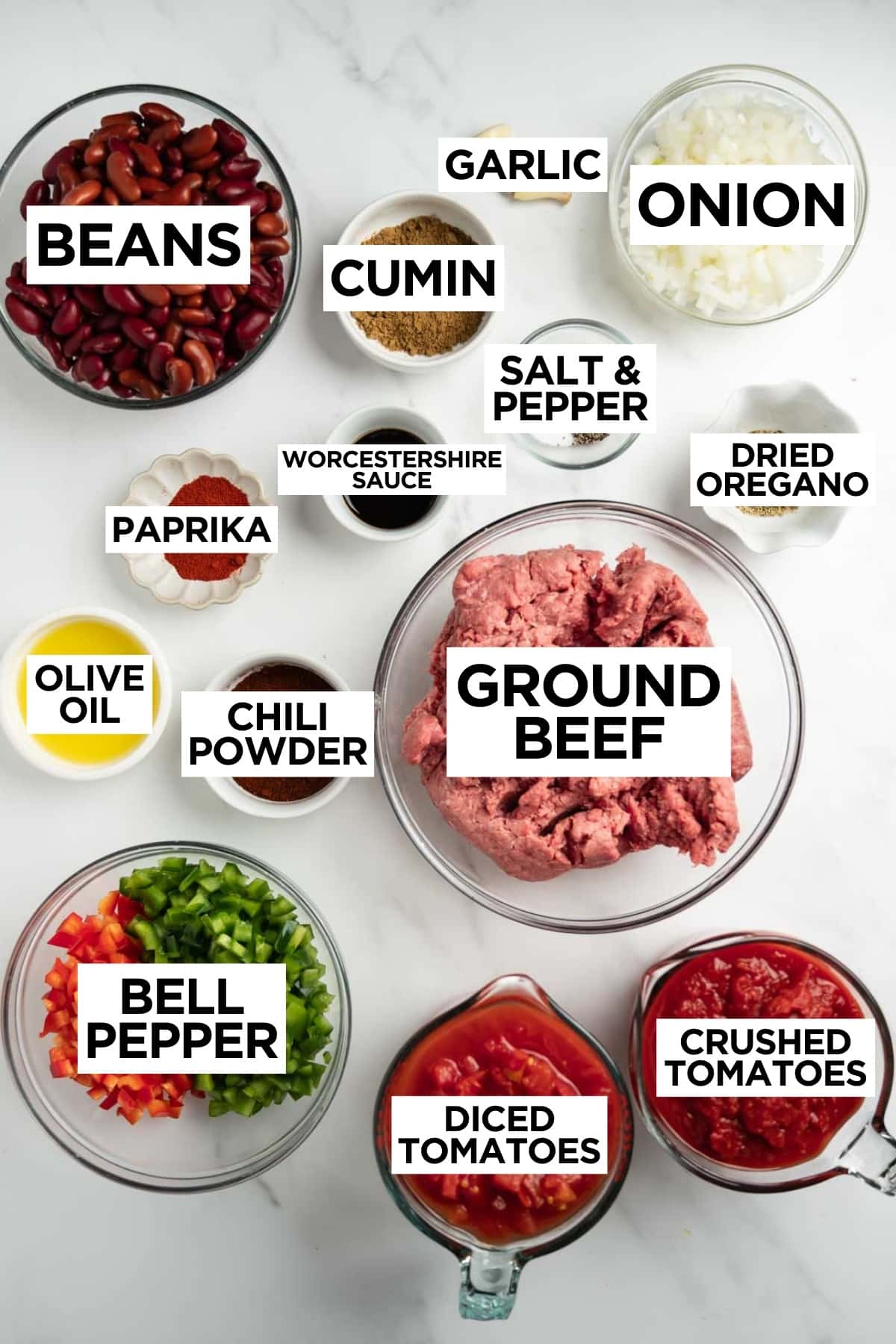 ingredients in bowls for homemade chili with overlay text.