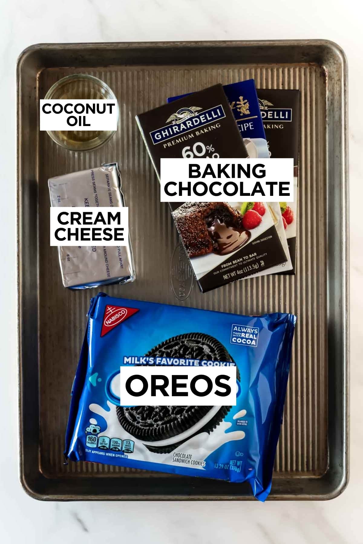 ingredients for oreo balls recipe on a baking sheet.