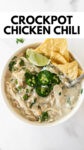 white chicken chili in a bowl with a spoon with overlay text.