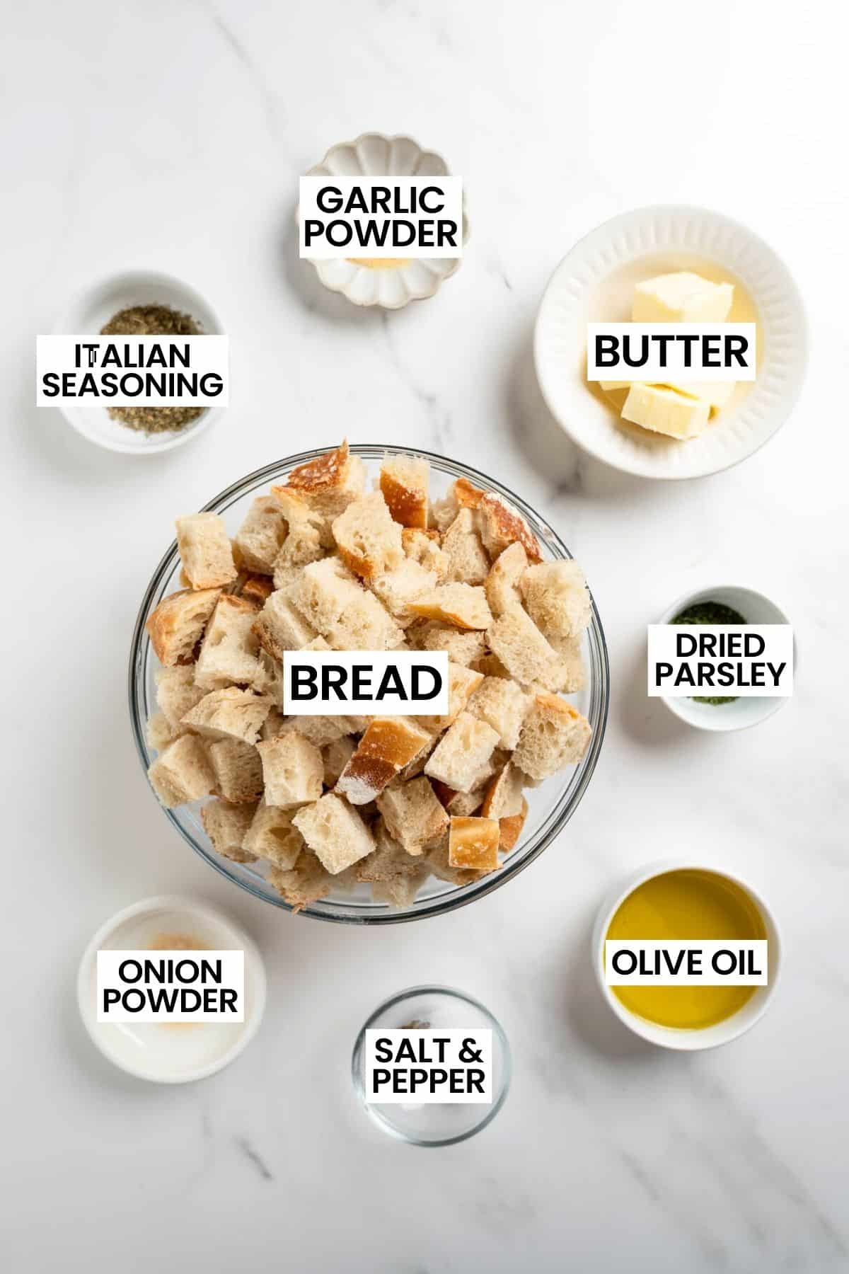 ingredients for homemade croutons in bowls with overlay text.