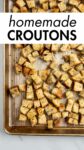 croutons on a baking sheet with overlay text.