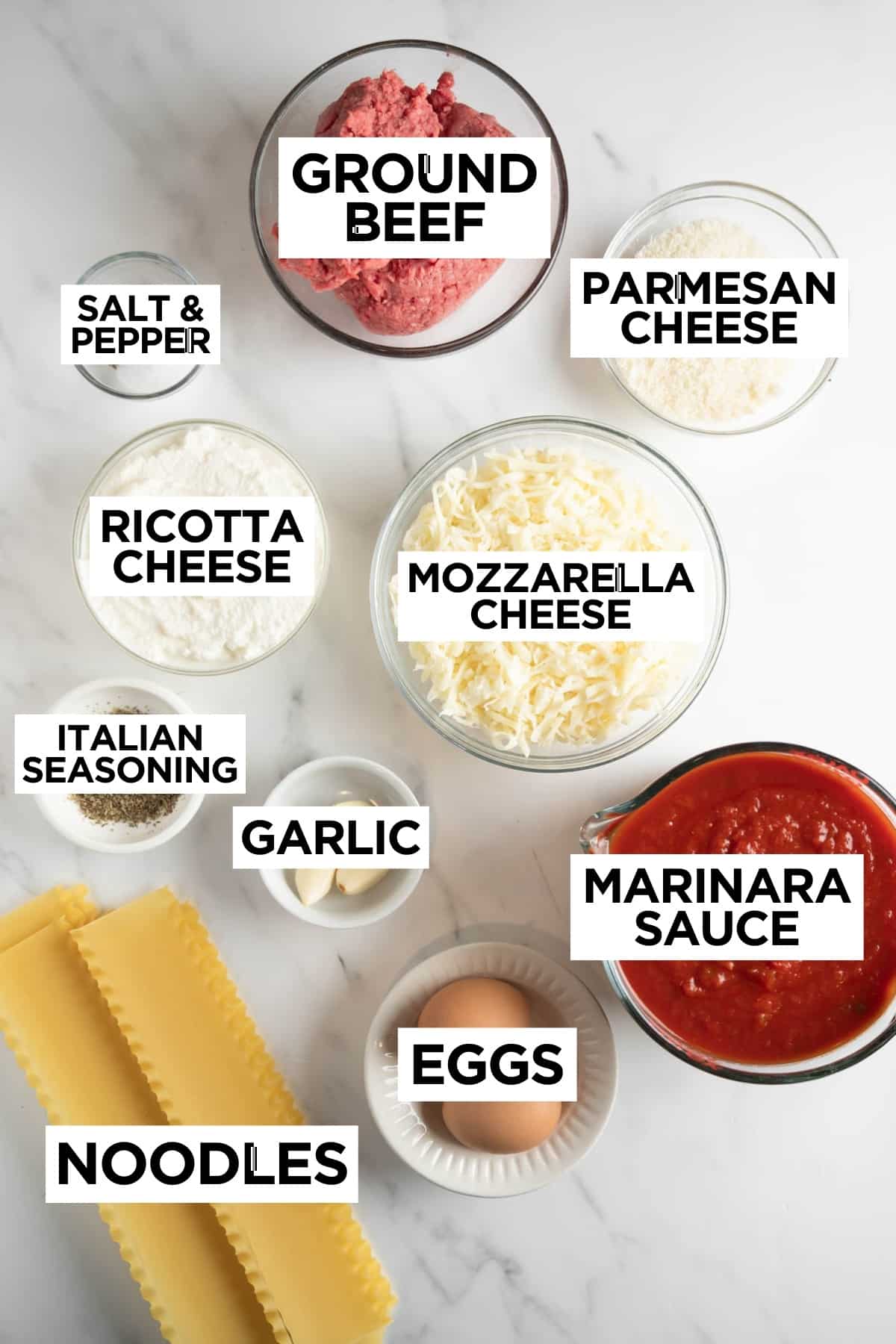 ingredients for homemade lasagna in bowls with overlay text.