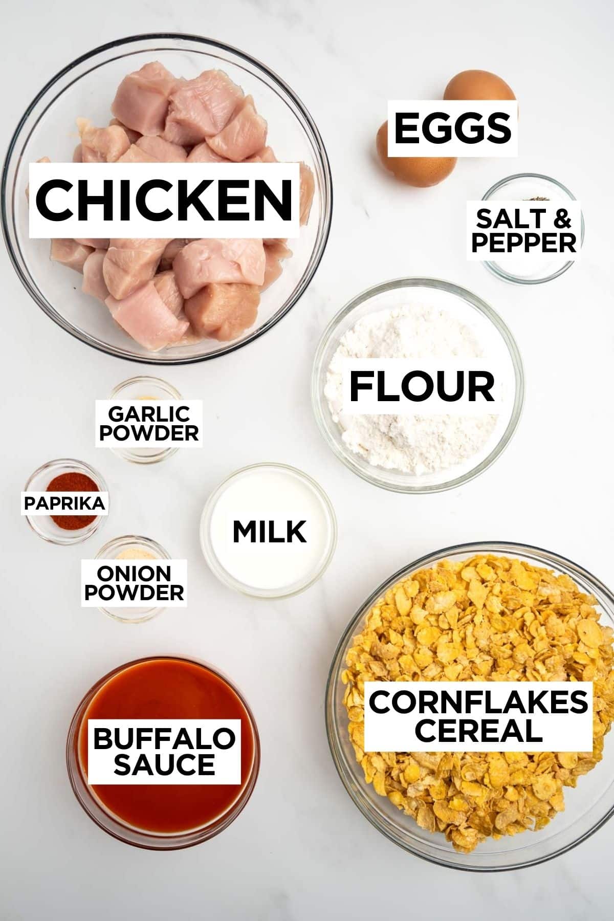 ingredients for boneless buffalo wings in bowls with overlay text.