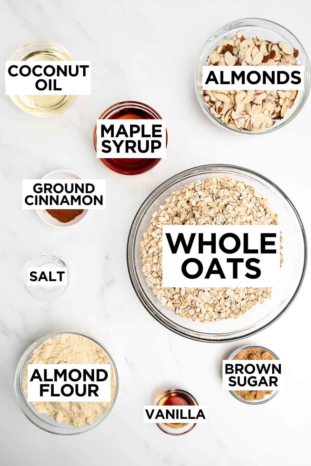 granola cluster ingredients in bowls with overlay text.