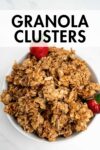 granola clusters in a bowl with overlay text.