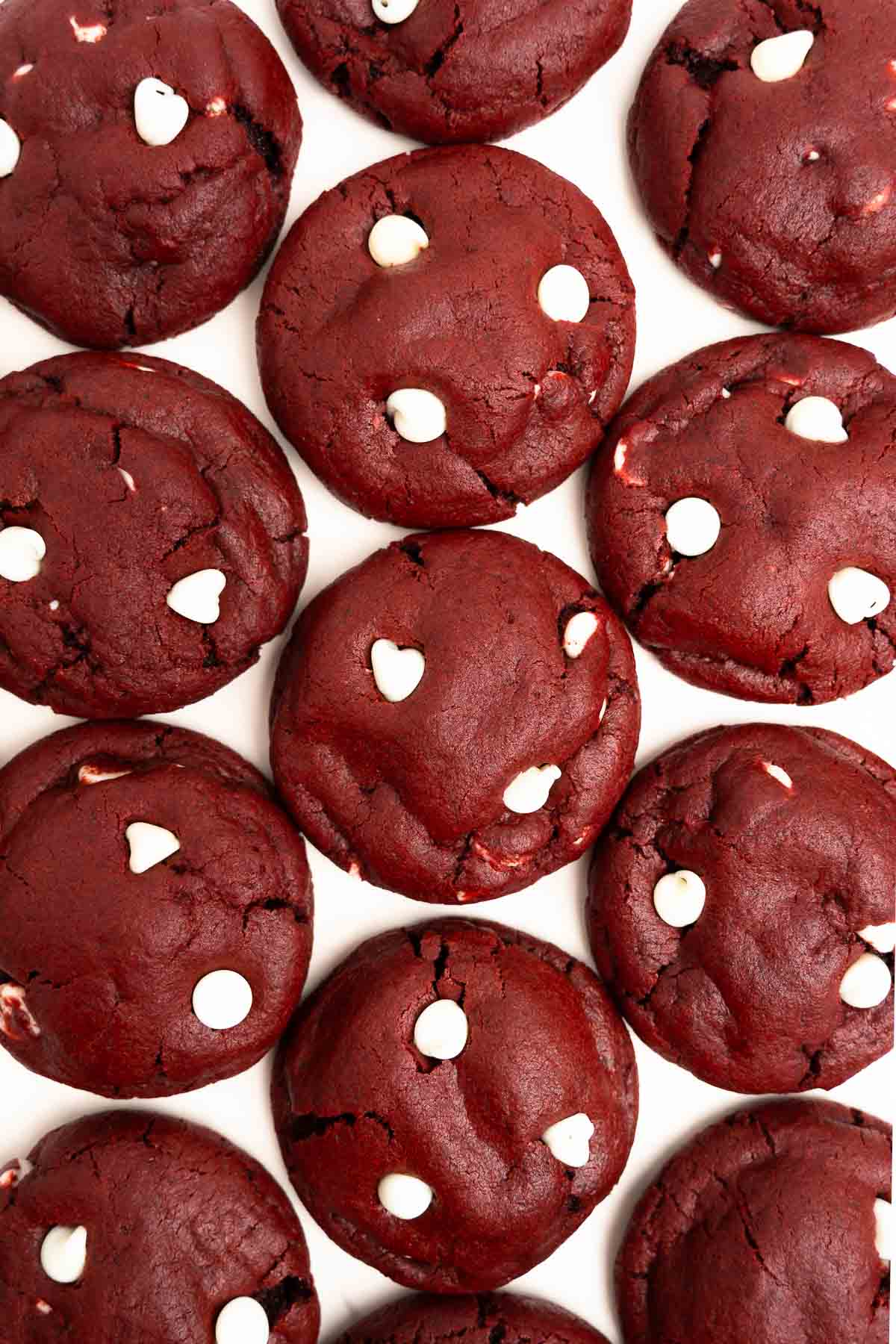 over head of red velvet cookies on a baking sheet.