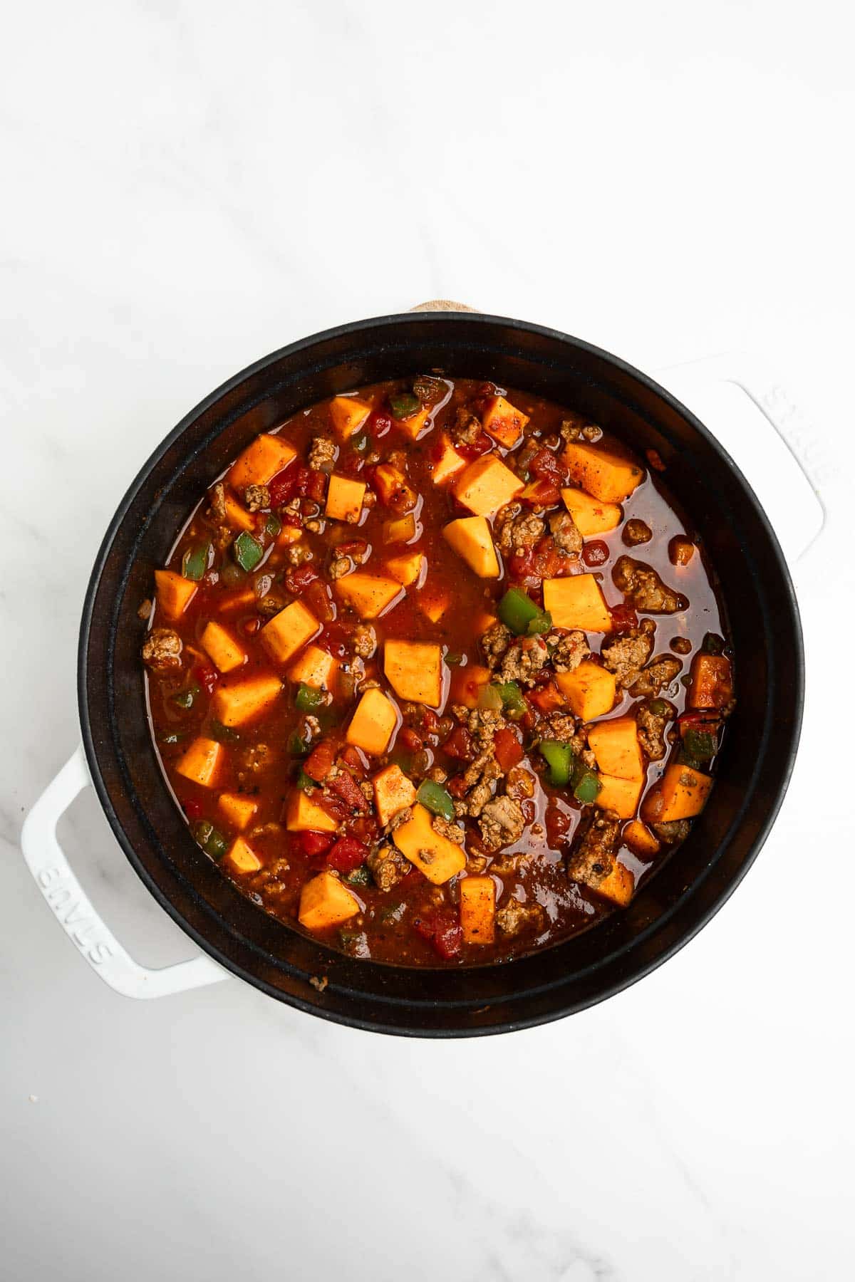 sweet potato turkey chili in a white pot.