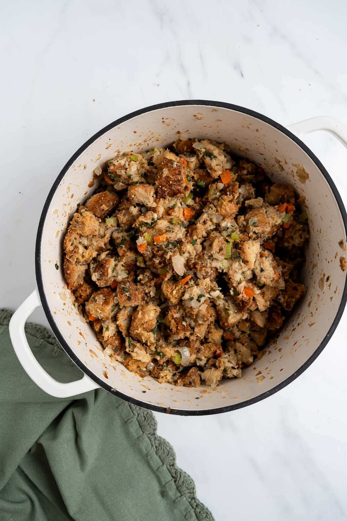 stuffing in a white pot.